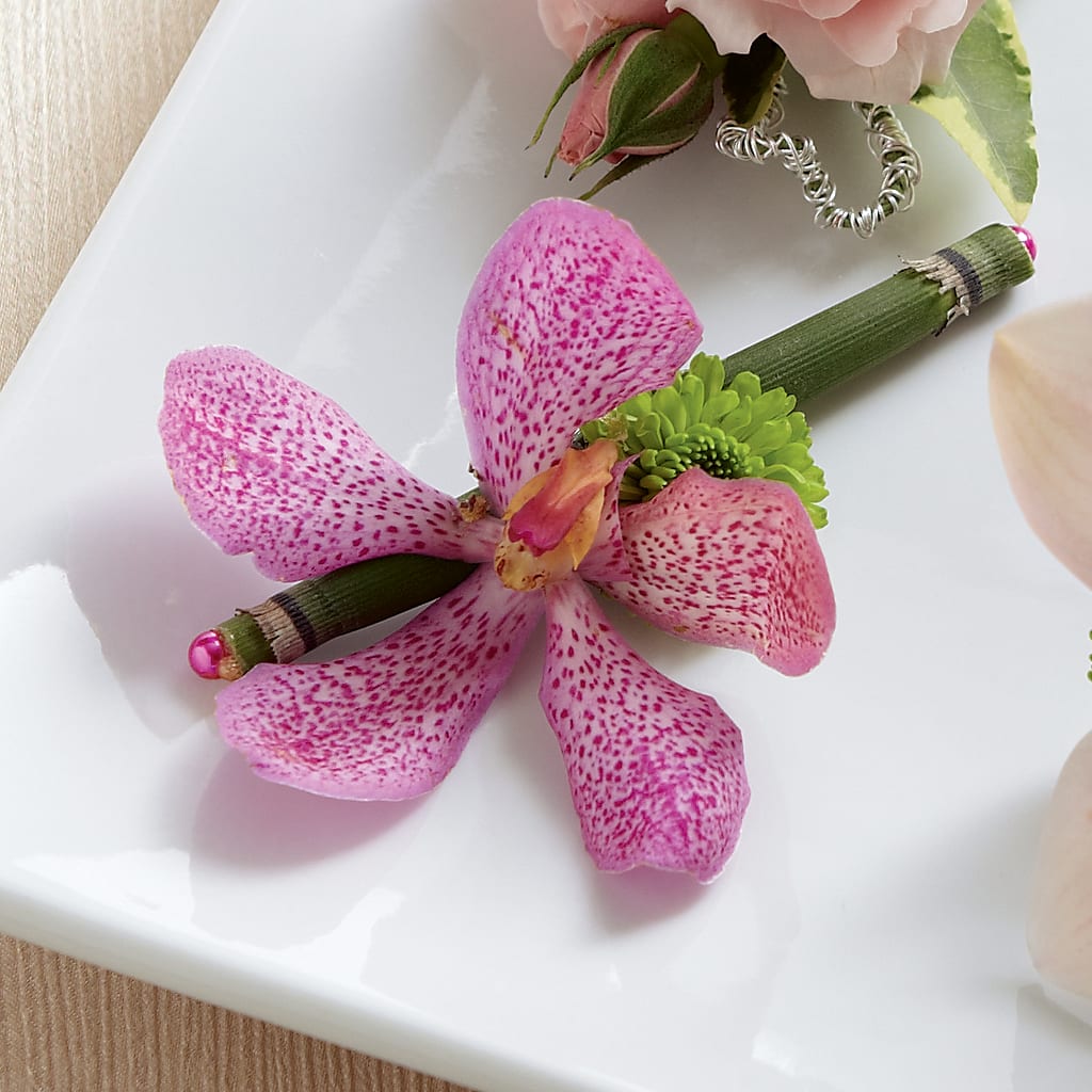 Pink Mokara Boutonniere –  Talia Flowers, Ottawa ON
